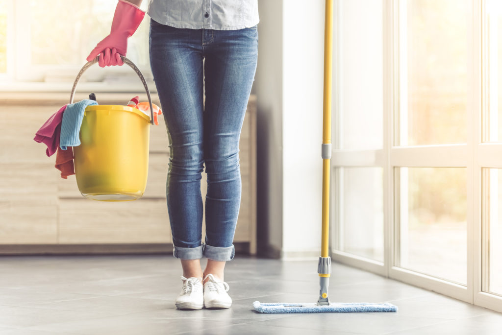 bigstock-Woman-Cleaning-Her-House-155508278